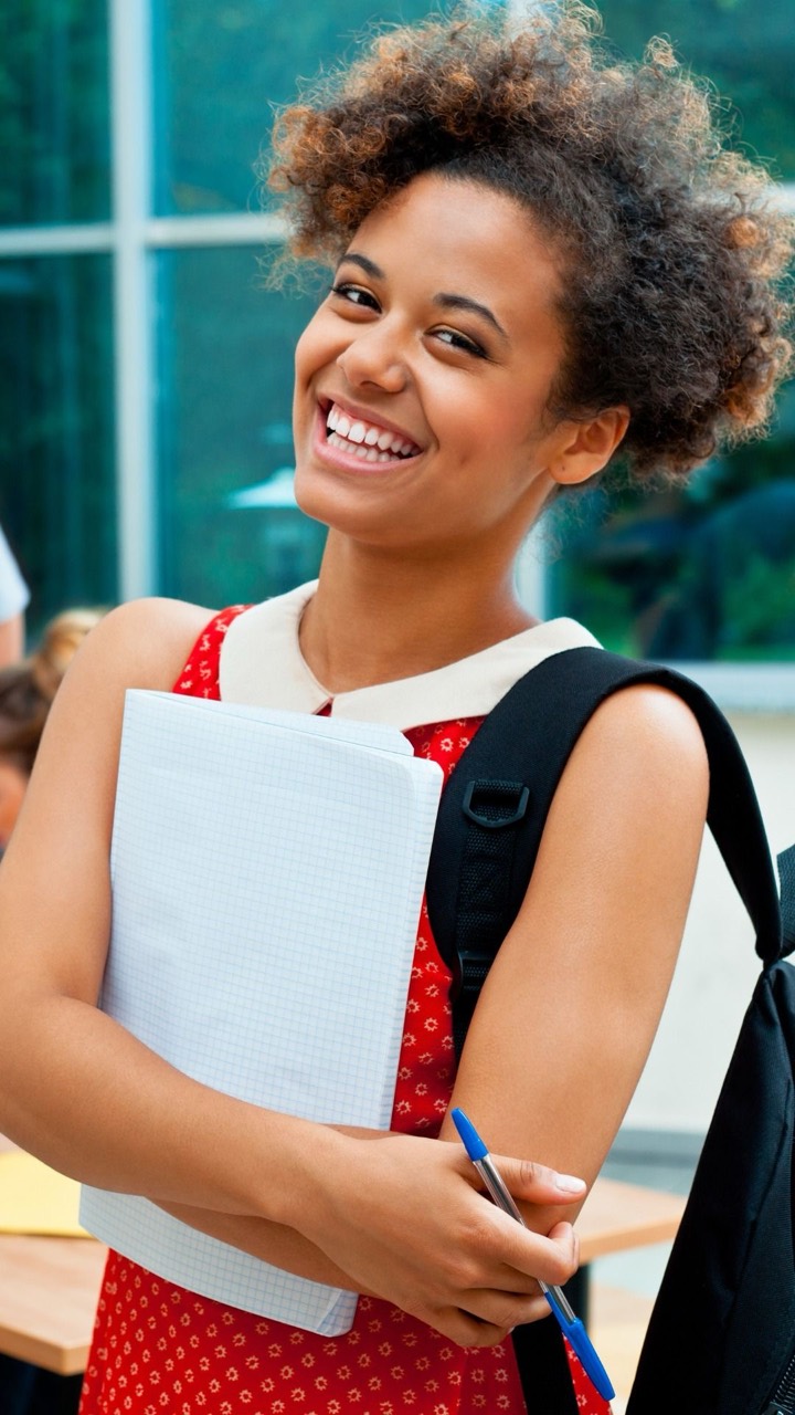 Smiling student ready to learn German